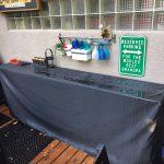 Outdoor bar with black cover. WeatherMax