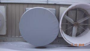 Giant fan with gray cover.