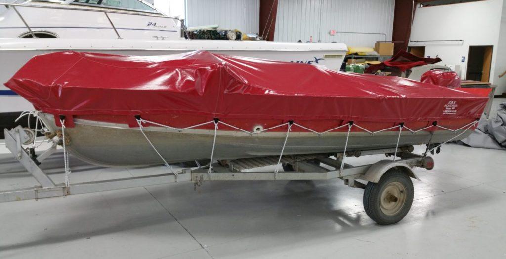 Boat with red cover.