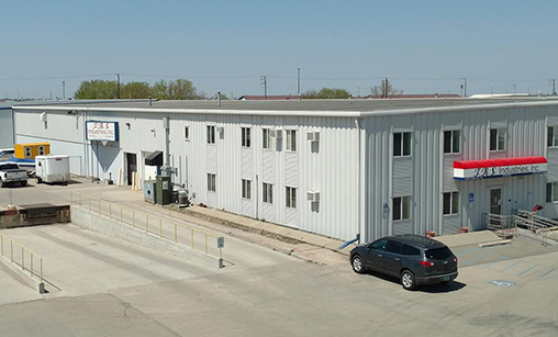 TRS_Industries_Fargo-ND An exterior view of the large TRS Industries facility and office building located in Fargo, ND.