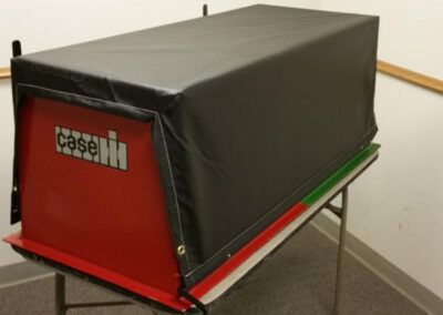 Farm tarp system display demonstrating agricultural applications