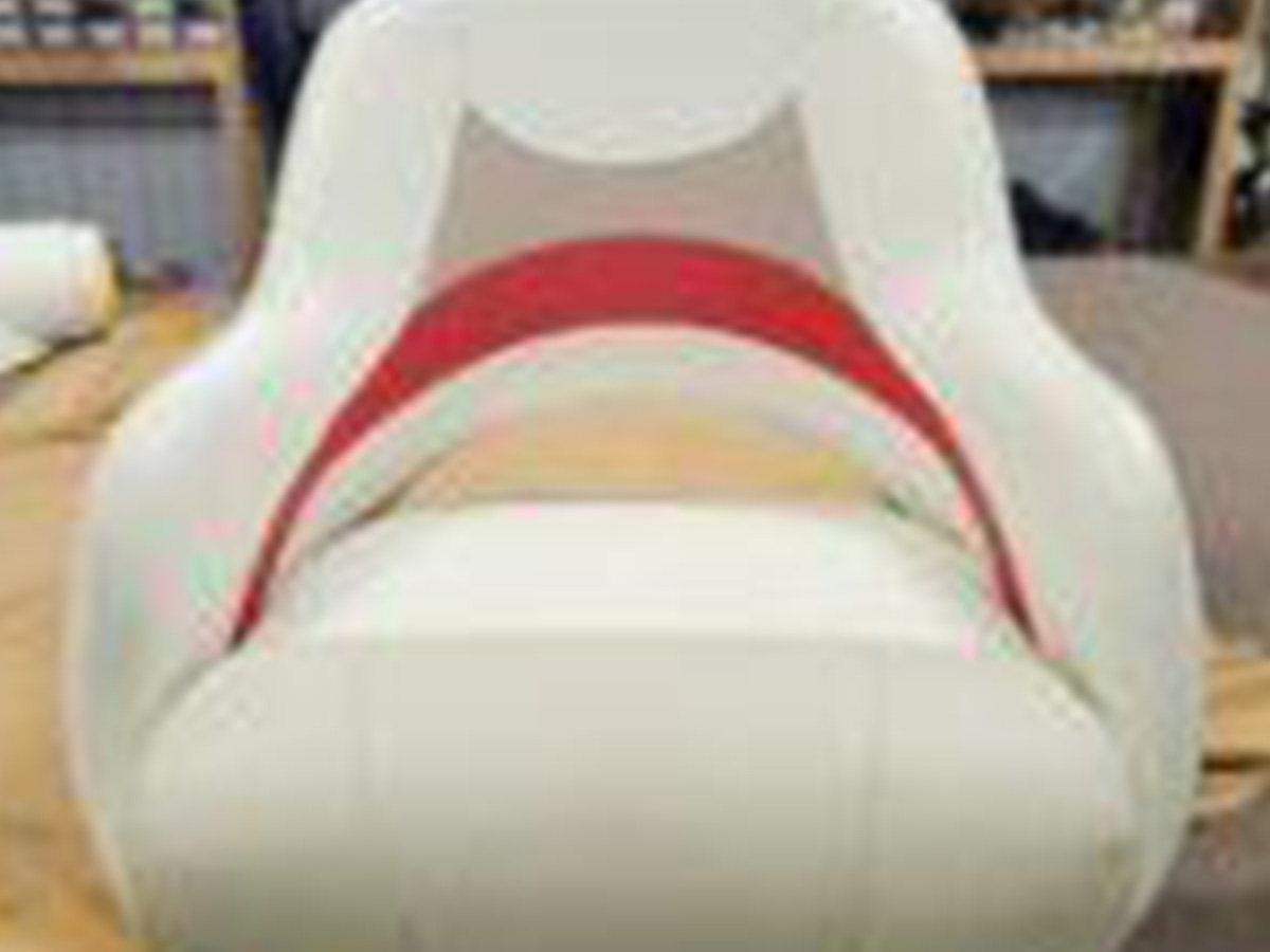 burgundy-bimini-top-with-clear-windshield Side view of a burgundy marine canvas bimini top integrated with a clear vinyl front windshield panel.