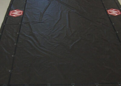 Smoke tarp installed over the front portion of a trailer