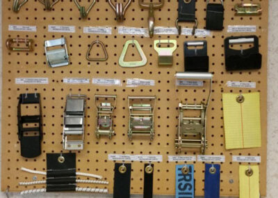 Cargo control webbing and hook hardware options for securing loads