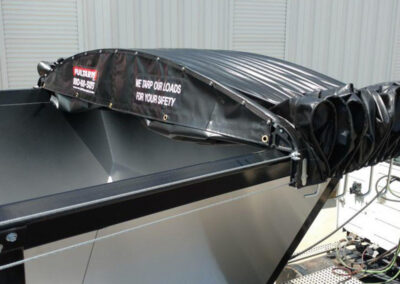 Electric roll tarp installed on a commercial hauling trailer