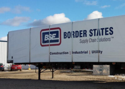 Retractable Conestoga trailer covering system on a flatbed