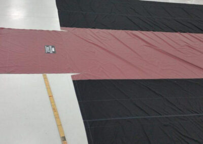 Lumber tarp with customer-selected color scheme
