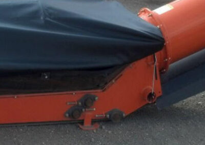 Back of additional fitted hopper tarp cover on grain equipment
