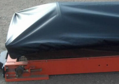 Front of additional fitted hopper tarp cover on grain equipment