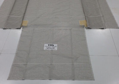 Completed bee net system laid out on the ground before installation