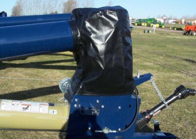 Hopper auger boot installed on a grain handling system