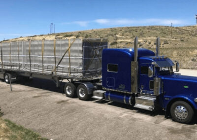 Installed bee net system mounted on a semi-truck trailer