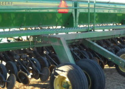 John Deere grain drill used in farm tarp system applications