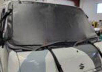 Custom windshield cover fitted to an off-road vehicle