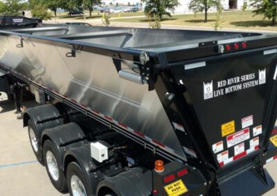 Open roll tarp system showing trailer access and operation
