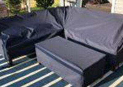 Multi-piece outdoor furniture covers including a coffee table cover