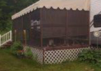 PatioMate patio enclosure system installed over an outdoor area