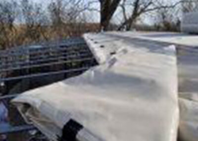 Early installation phase of a PatioMate patio top structure