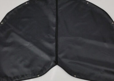 Plain black vinyl winter front cover for a semi-truck