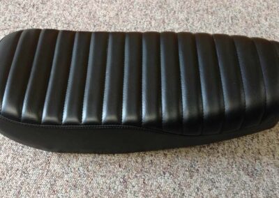 Snowmobile seating restored with custom upholstery materials