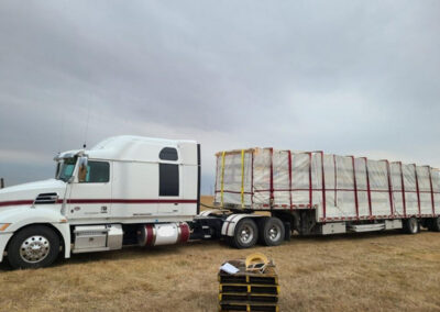 Mesh bee net system installed on a semi-truck trailer during installation