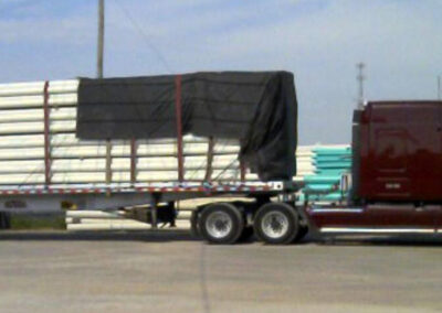 Smoke tarp covering the front section of a trailer load