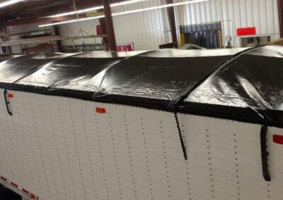 Supreme roll tarp system installed on a hauling trailer