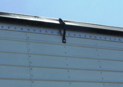 Bungee attachment points on a trailer tarp system