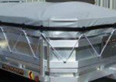 Custom fitted cover installed on a utility trailer