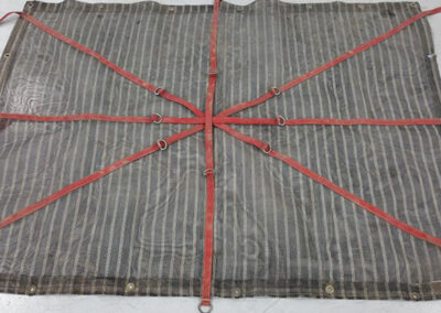 Original worn industrial machinery cover before replacement